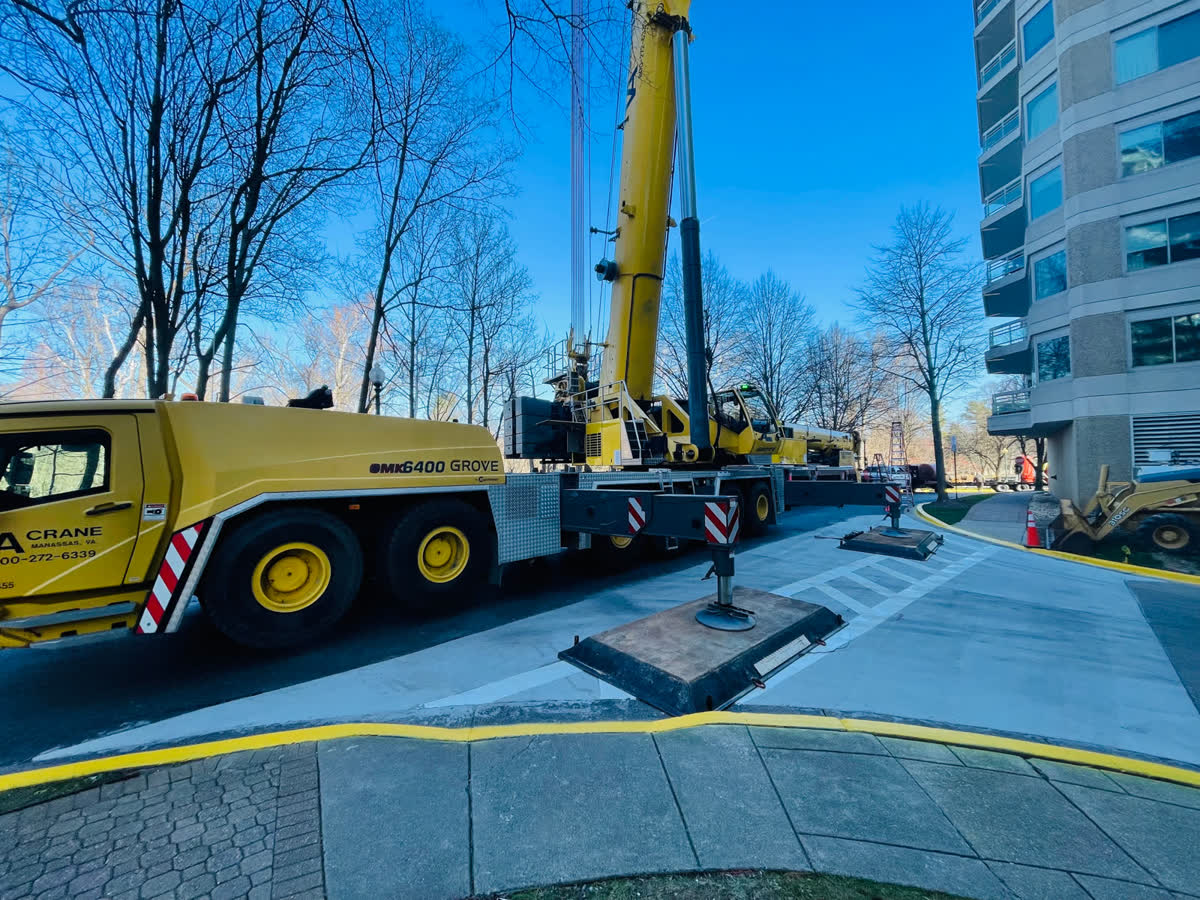 Crane lift onto a commercial roof